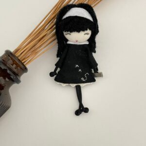 Broche Muñeca