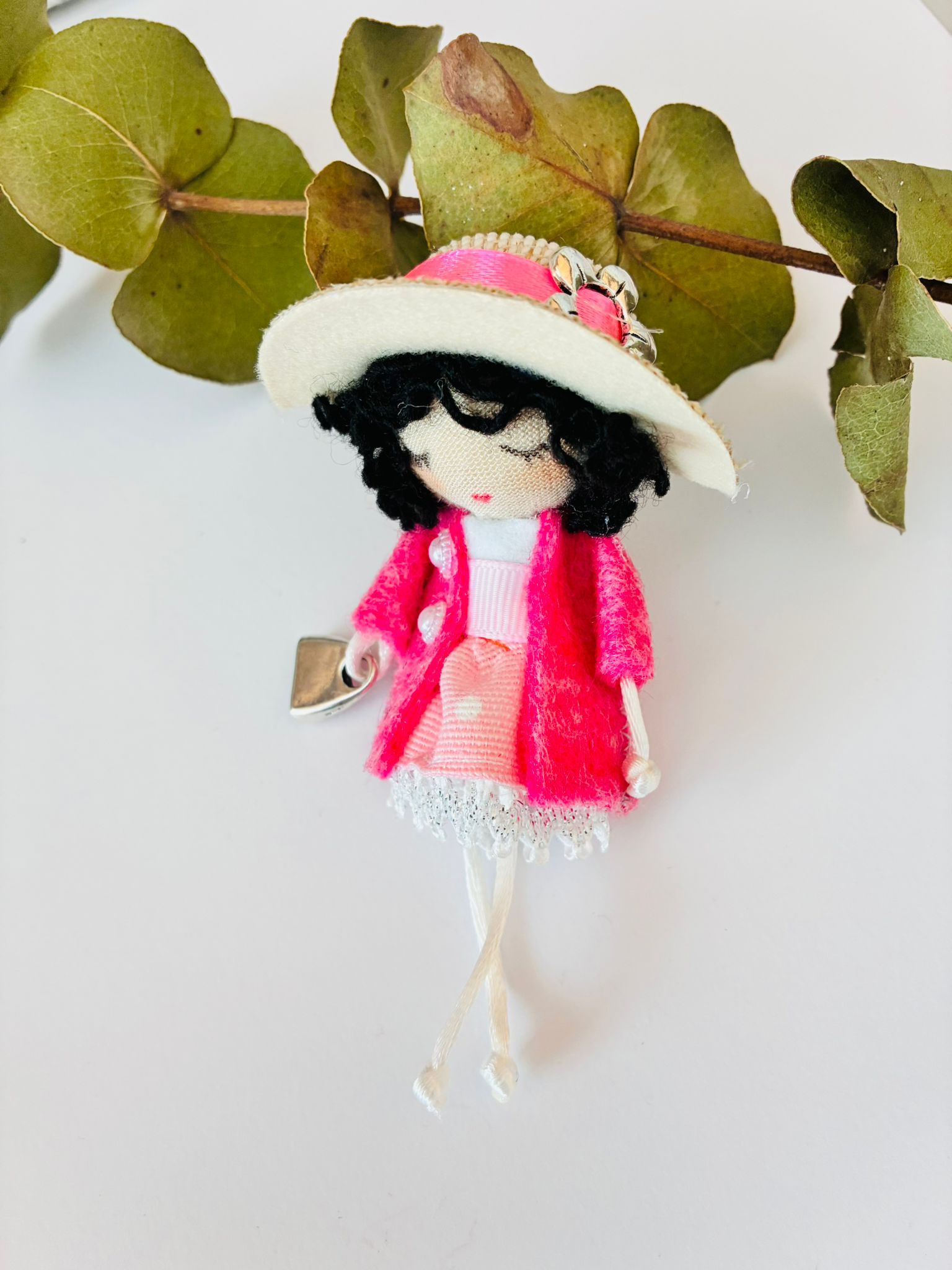 Broche Muñeca
