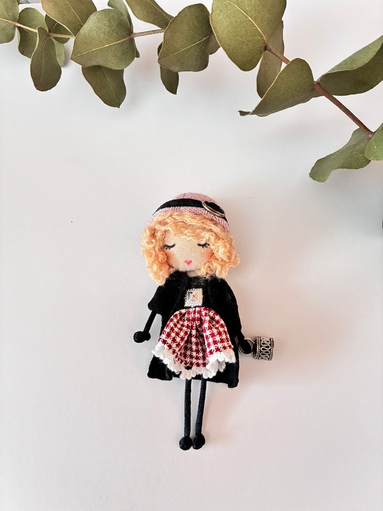 Broche Muñeca
