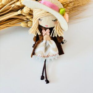 Broche Muñeca