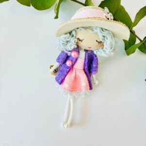 Broche Muñeca