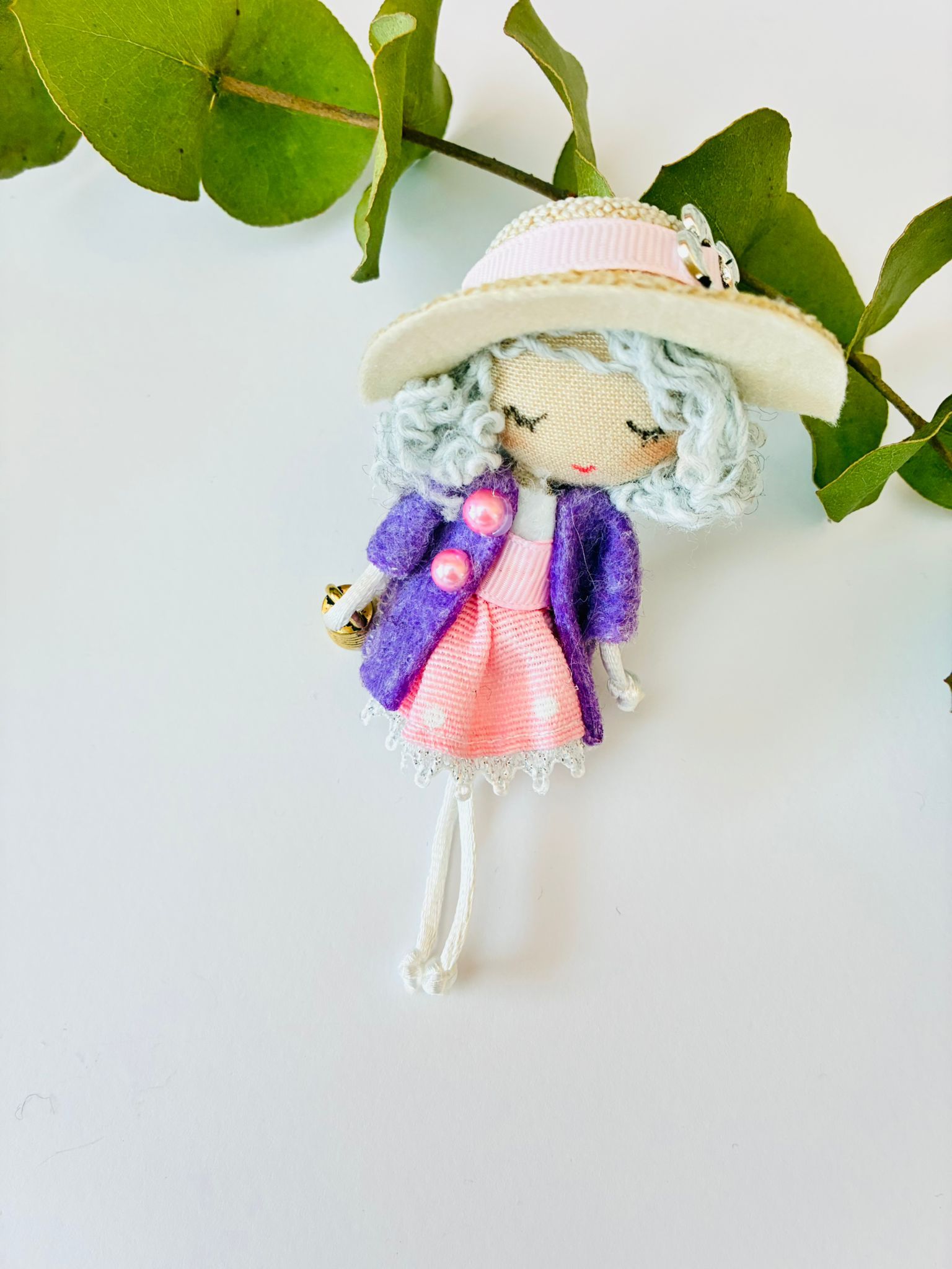 Broche Muñeca