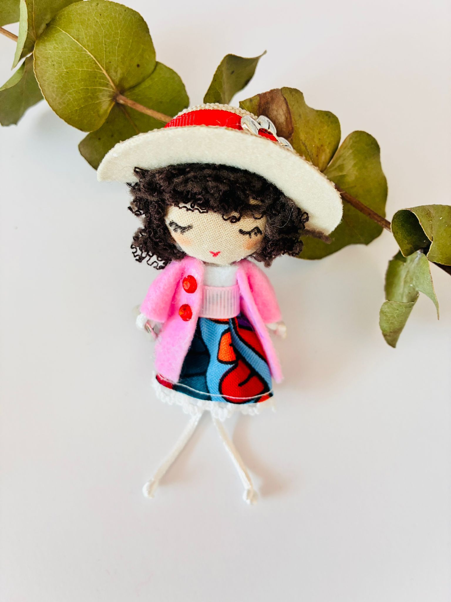 Broche Muñeca