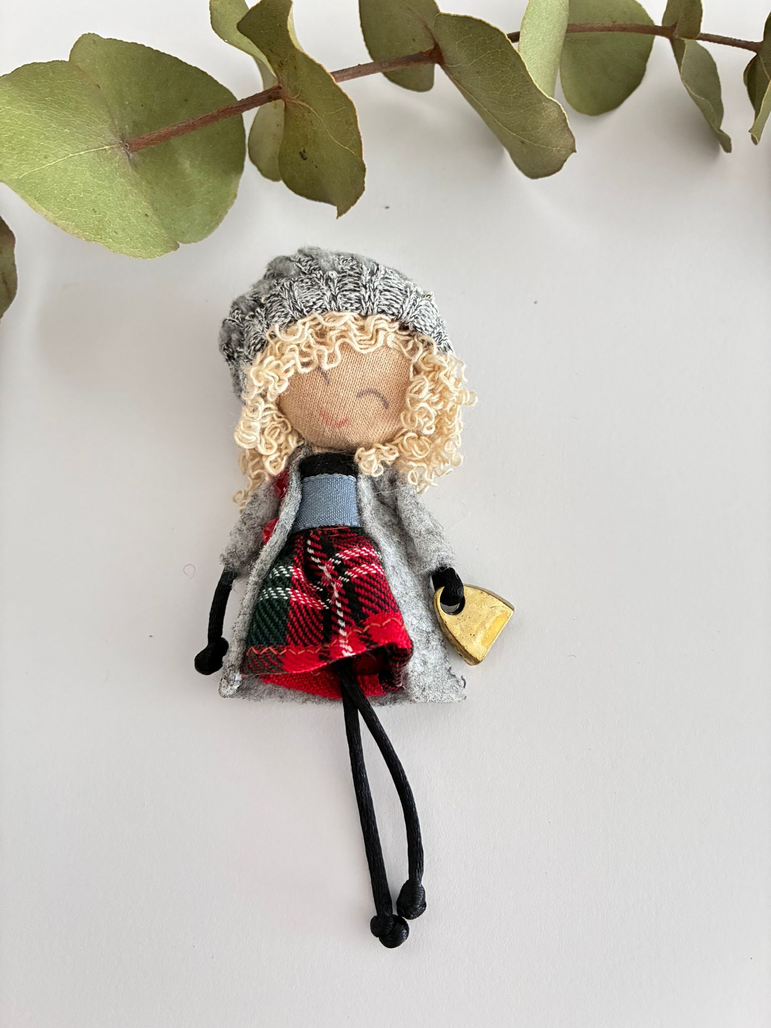 Broche Muñeca
