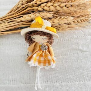 Broche Muñeca